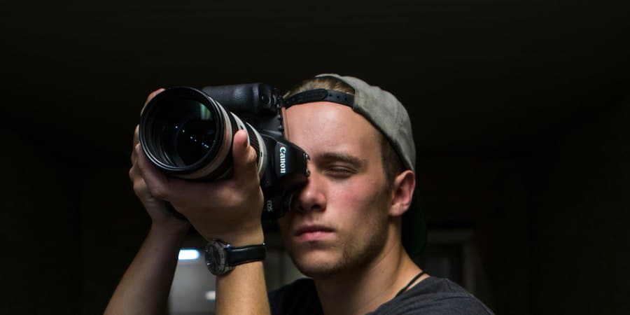Videographer holding a camera